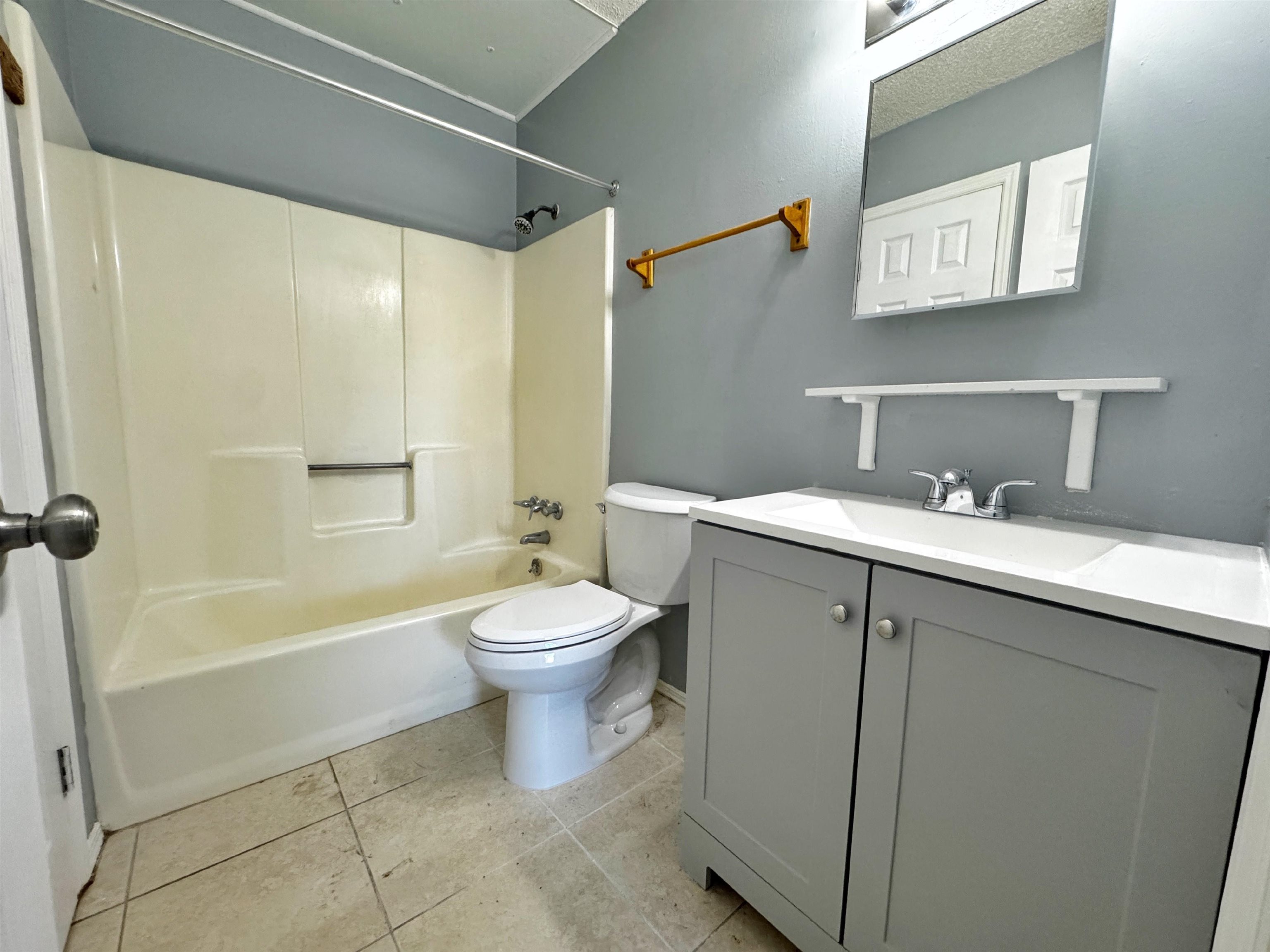 5950 Highway 1, Unit A St. Augustine, FL 32086 - Photo 9 of 13 a bathroom with a sink a toilet and shower