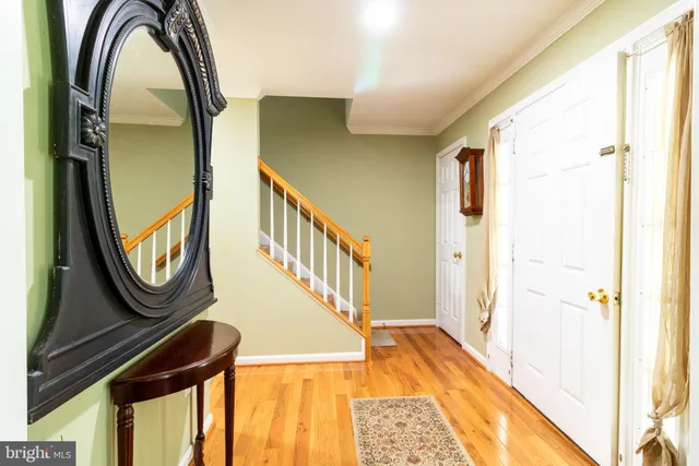a view of stairs and with wooden floor