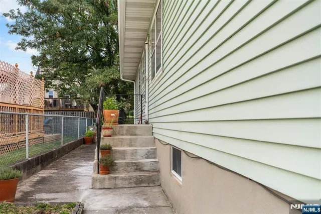 a view of a bench in a backyard