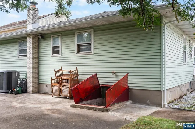 an aerial view of houses with yard