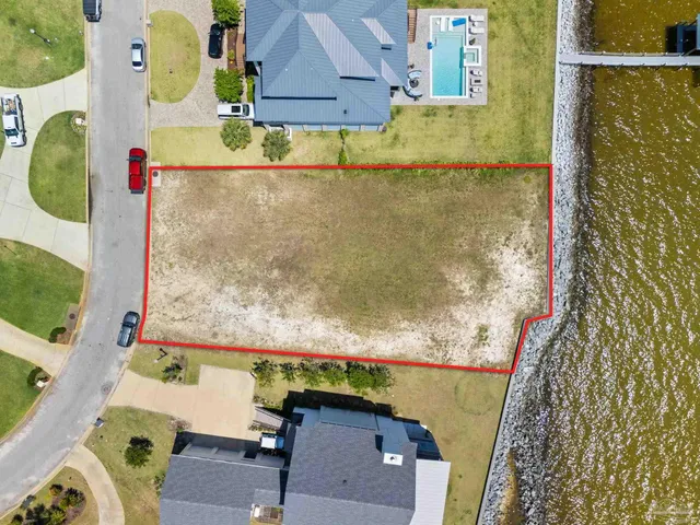 a bathroom with a sink mirror vanity and bathtub
