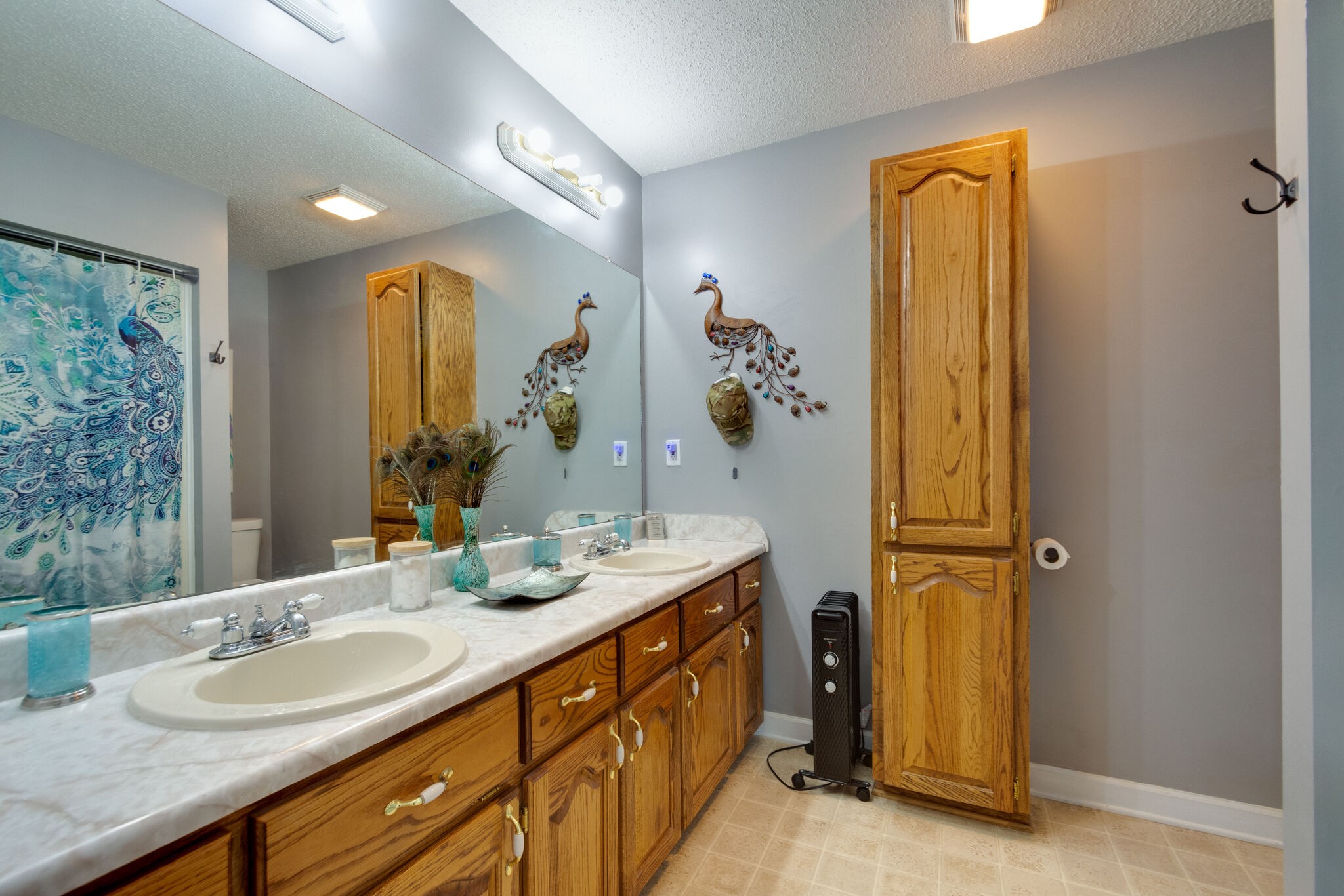 1155 Johnson Branch Road Pulaski, TN 38478 - Photo 23 of 45 a bathroom with a double vanity sink and a mirror