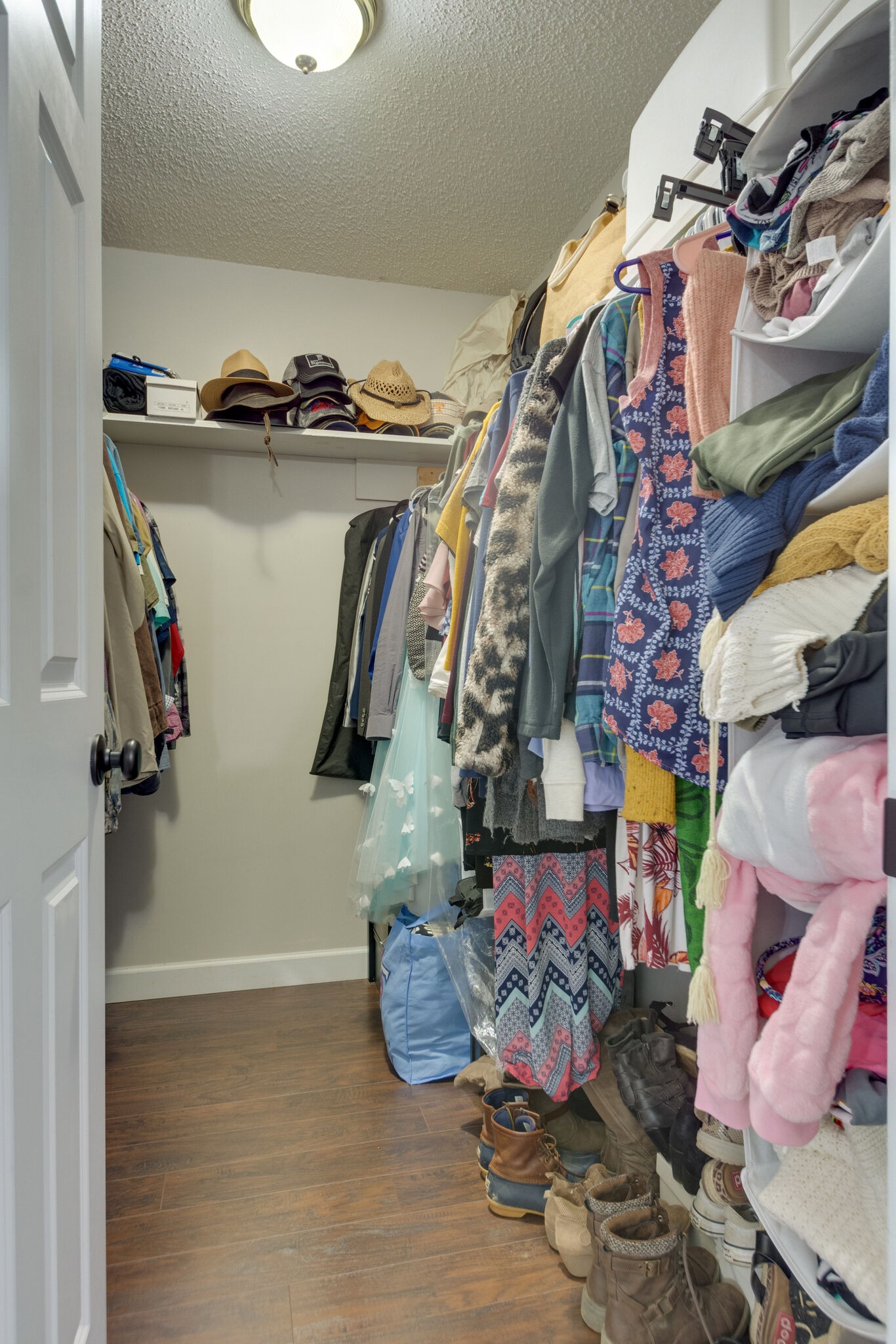 1155 Johnson Branch Road Pulaski, TN 38478 - Photo 25 of 45 a room with lots of different colored cloths