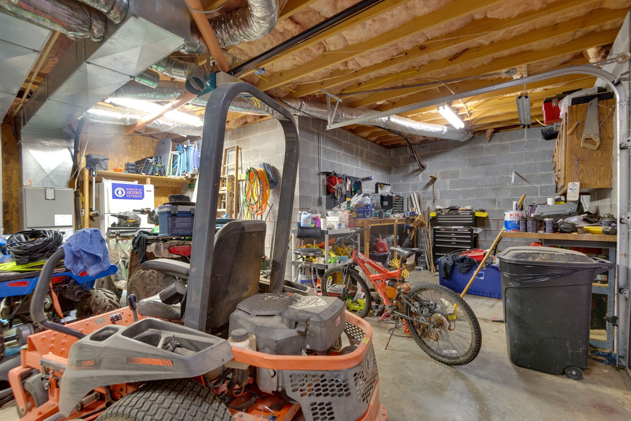1155 Johnson Branch Road Pulaski, TN 38478 - Photo 38 of 45 a view of a storage room with a lot of stuff