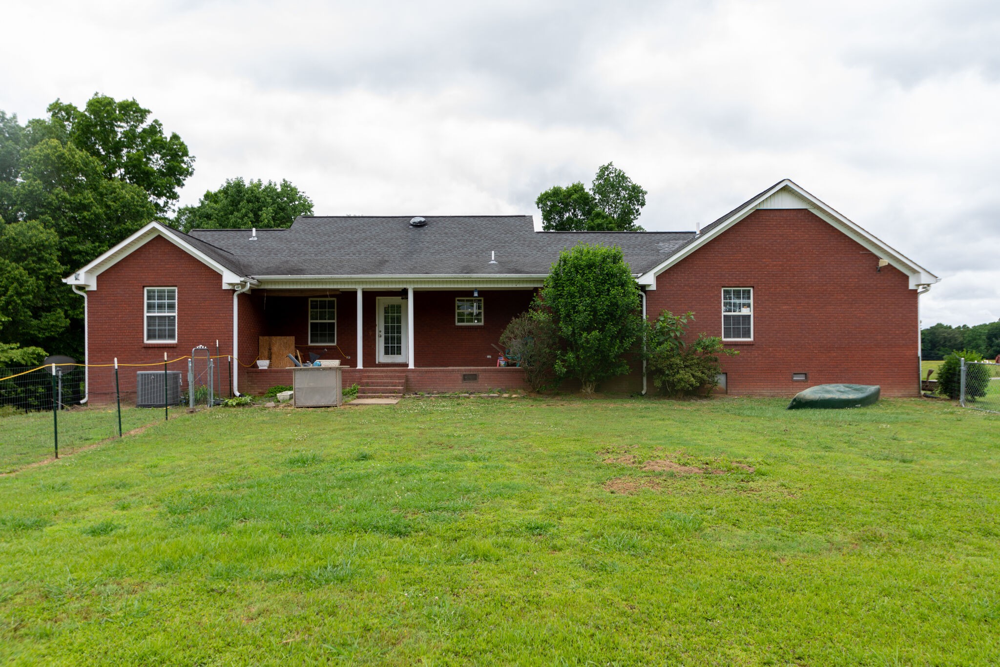 1155 Johnson Branch Road Pulaski, TN 38478 - Photo 44 of 45 a front view of a house with a garden