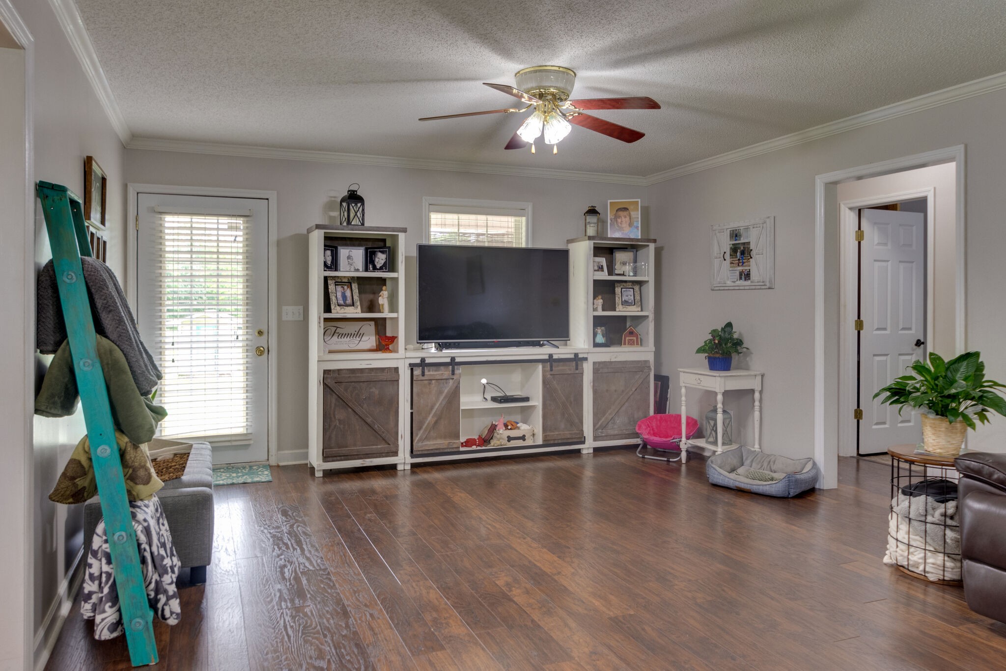 1155 Johnson Branch Road Pulaski, TN 38478 - Photo 7 of 45 a living room with furniture and a flat screen tv