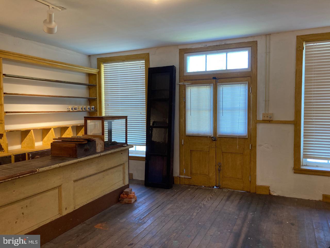 2113 Keysville Frederick Co Road Keymar, MD 21757 - Photo 37 of 49 REMAINING SHELVING IN STORE ROOM