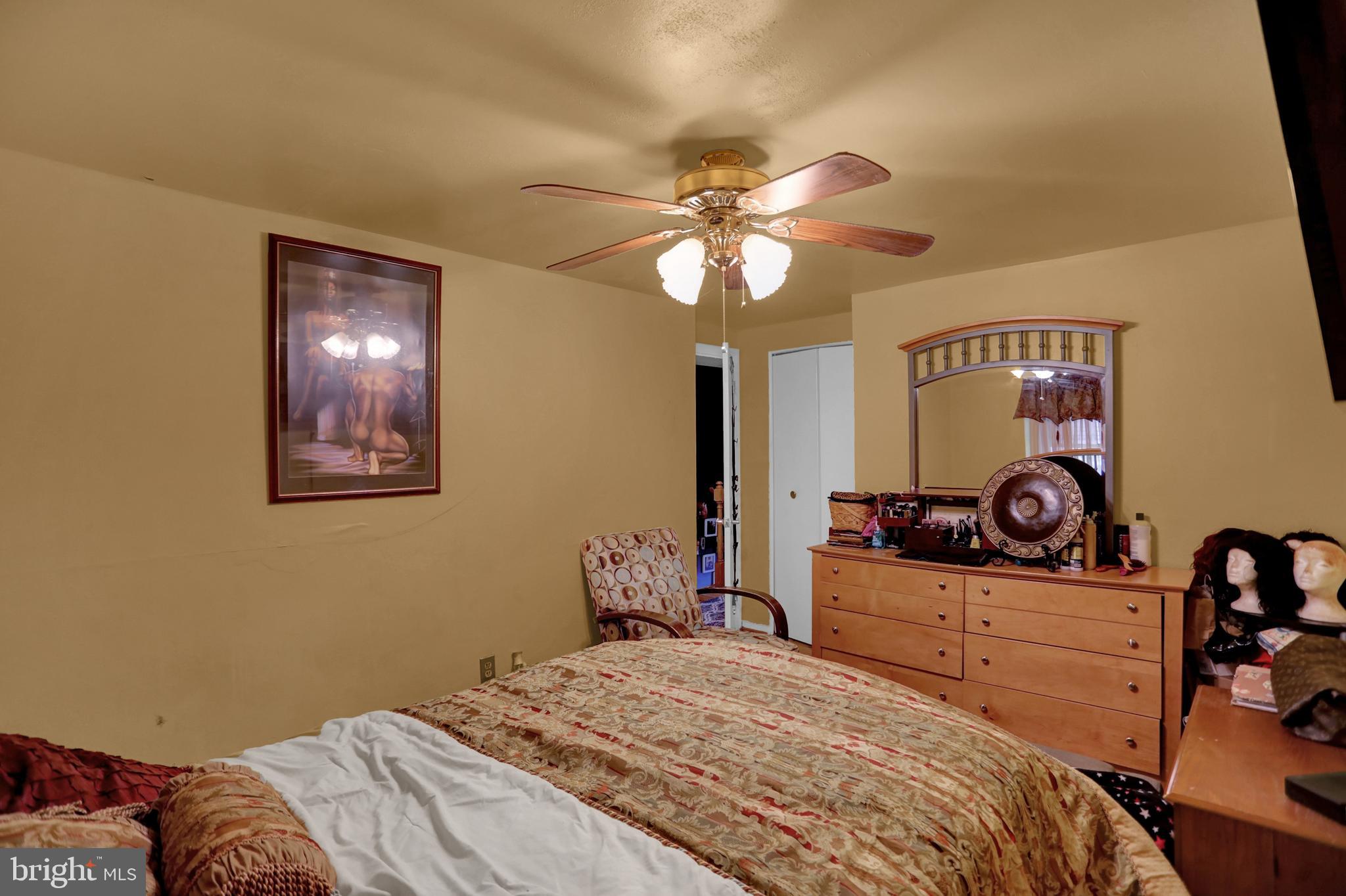 5749 Utrecht Road Baltimore, MD 21206 - Photo 15 of 25 Bedroom 2 has wood floors, ceiling fan, closet