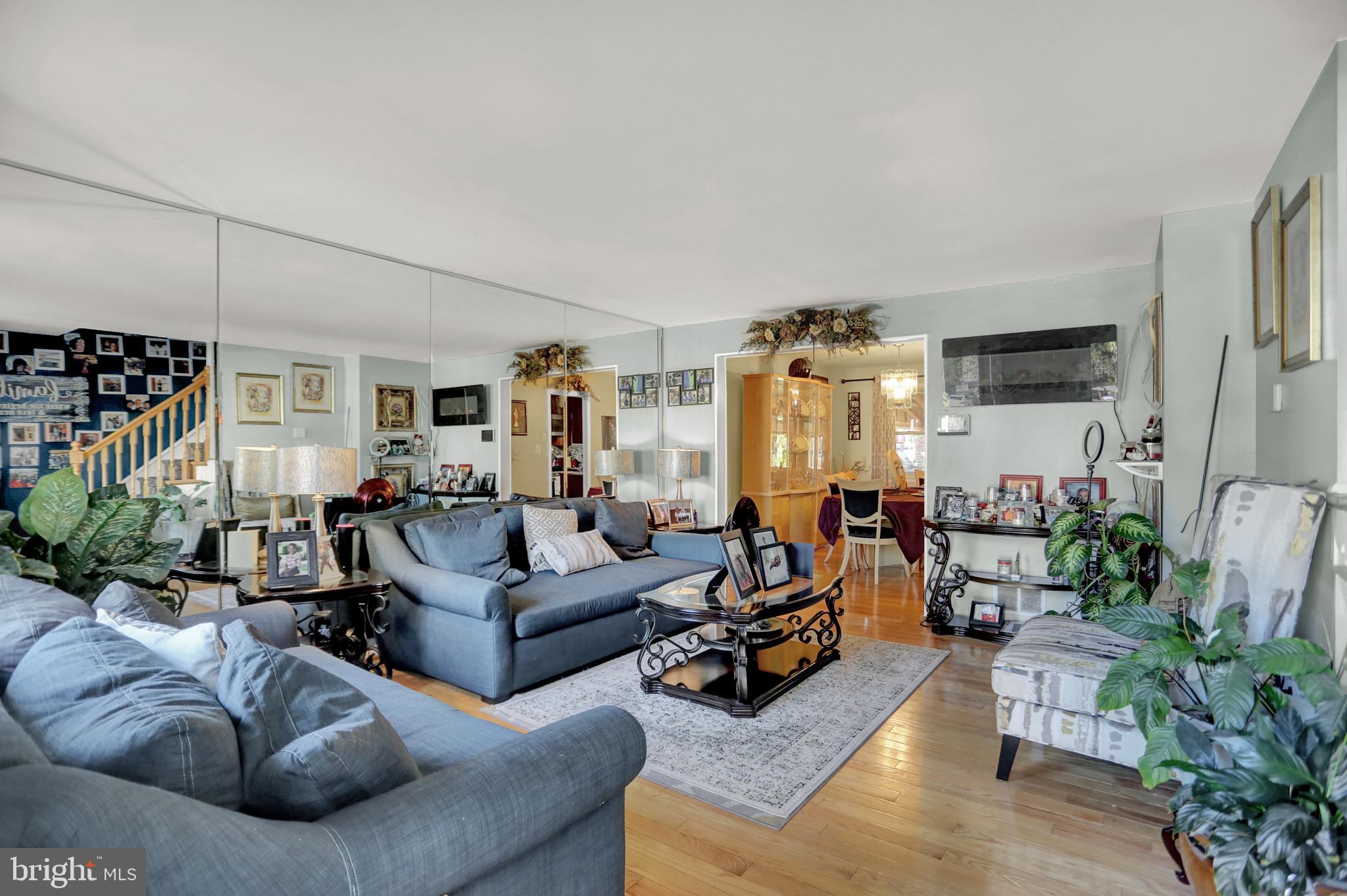 5749 Utrecht Road Baltimore, MD 21206 - Photo 5 of 25 A wall of mirrors enhance the first floor