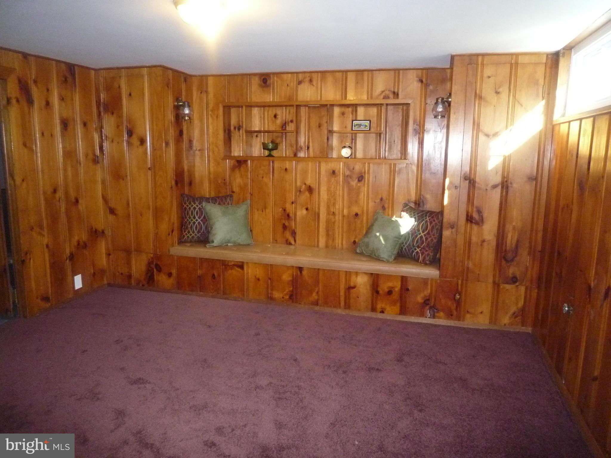 1042 Upnor Road Baltimore, MD 21212 - Photo 26 of 30 a view of an empty room with wooden walls