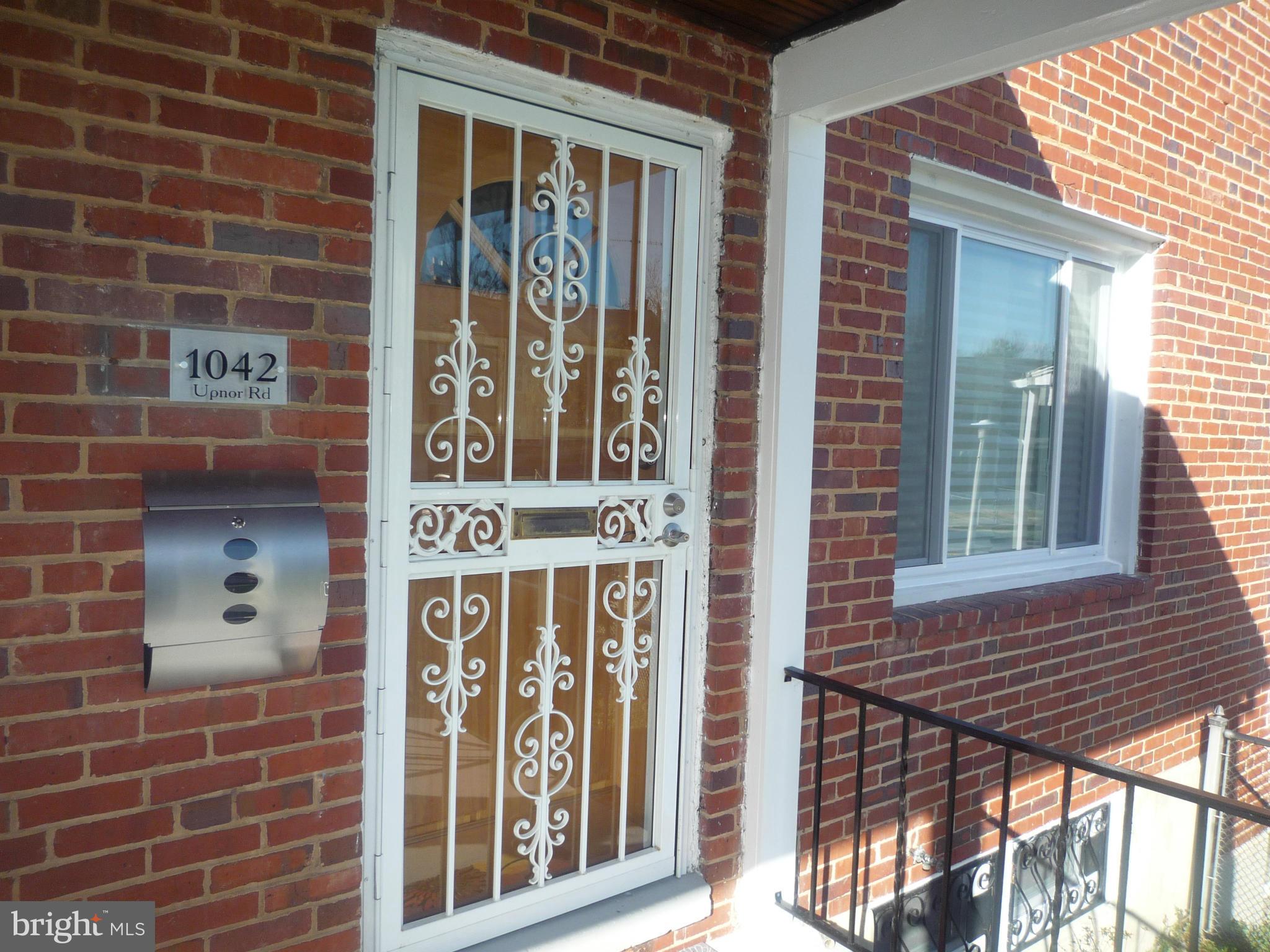 1042 Upnor Road Baltimore, MD 21212 - Photo 5 of 30 a view of front door of house