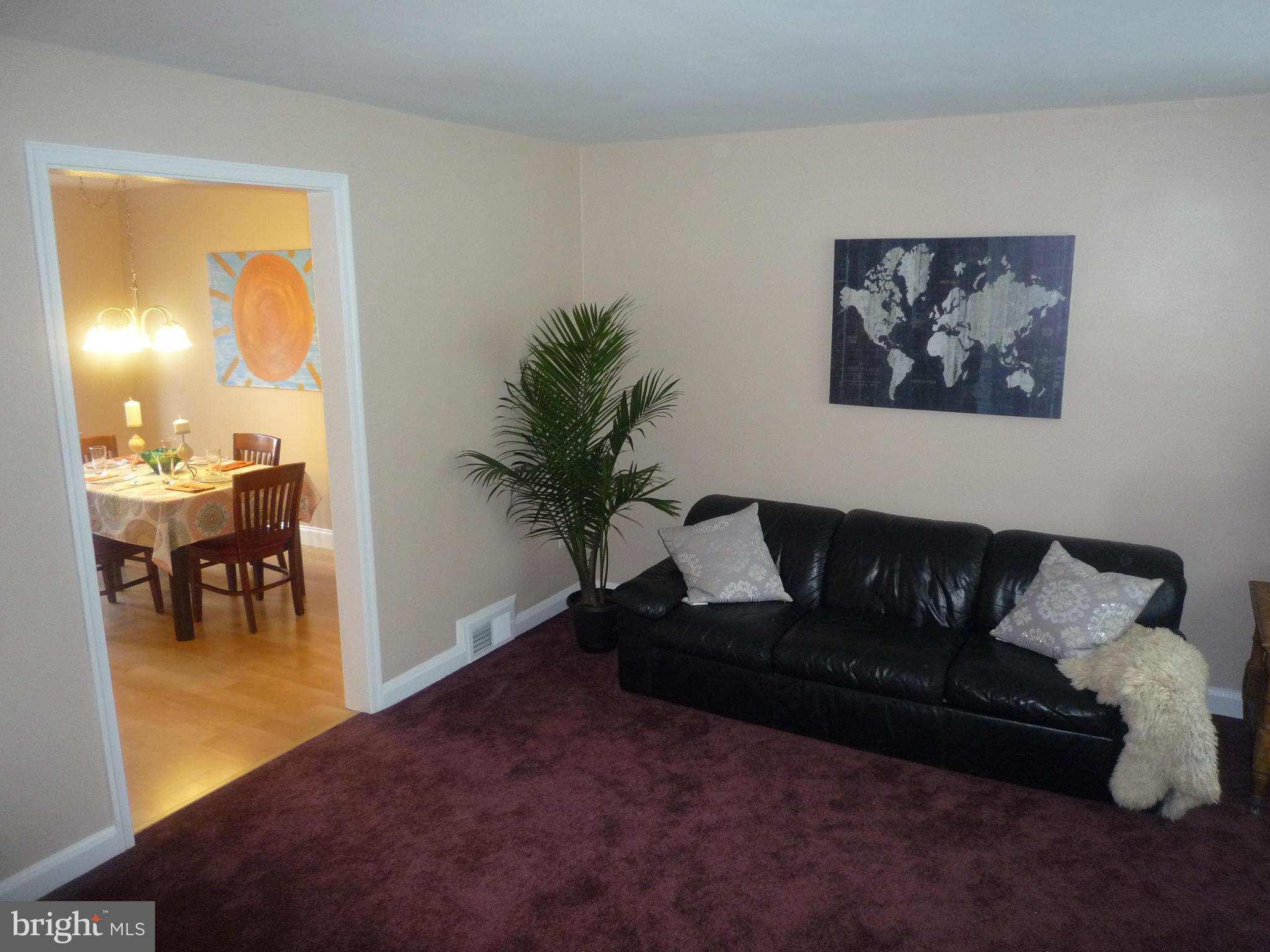 1042 Upnor Road Baltimore, MD 21212 - Photo 6 of 30 a living room with furniture and a large window