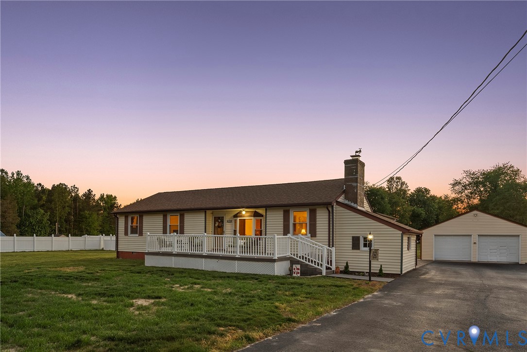 18024 Sandy Ford Road Petersburg, VA 23803 - Photo 2 of 66 a front view of a house with a yard