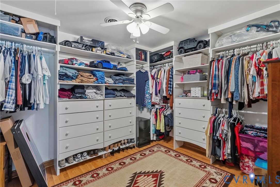 18024 Sandy Ford Road Petersburg, VA 23803 - Photo 27 of 66 a view of walk in closet with clothes and shoes