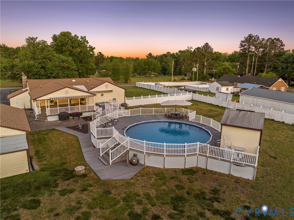 18024 Sandy Ford Road Petersburg, VA 23803 - Photo 46 of 66 a view of a swimming pool with a patio