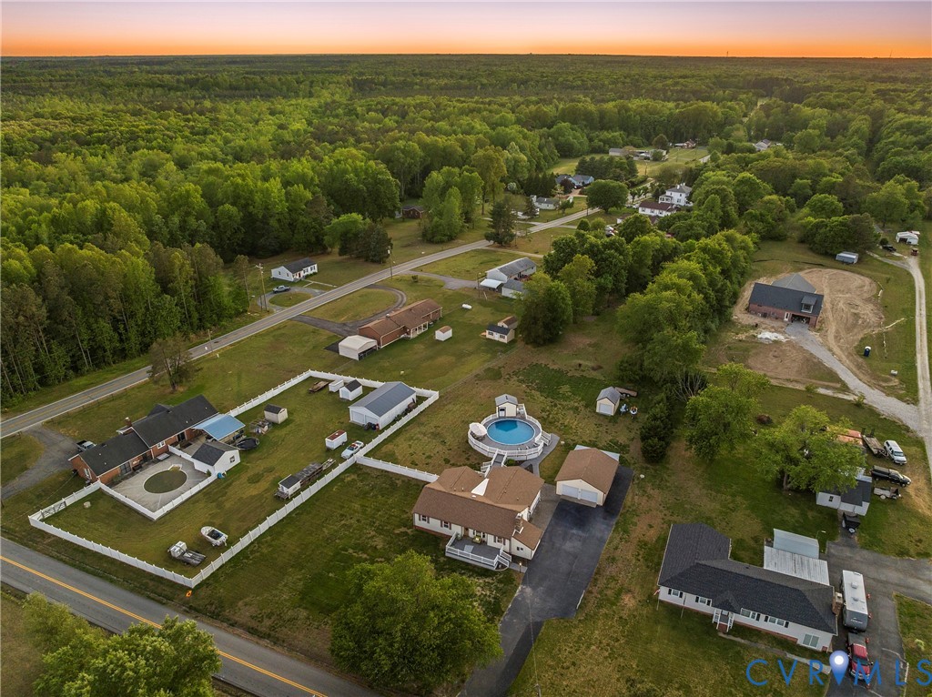 18024 Sandy Ford Road Petersburg, VA 23803 - Photo 5 of 66 an aerial view of a house with a yard