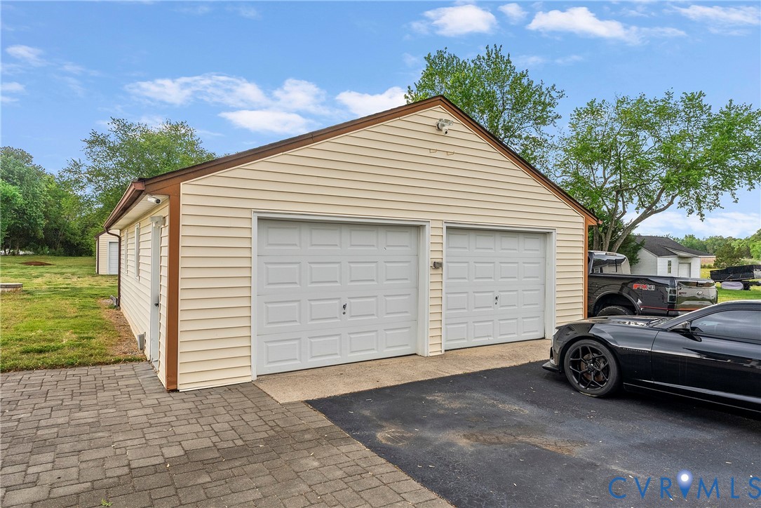 18024 Sandy Ford Road Petersburg, VA 23803 - Photo 55 of 66 a view of a car garage