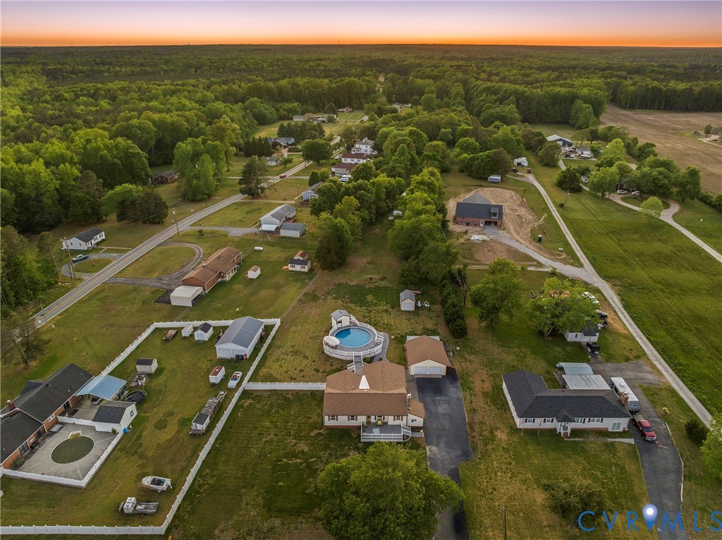 18024 Sandy Ford Road Petersburg, VA 23803 - Photo 6 of 66 an aerial view of residential houses with outdoor space