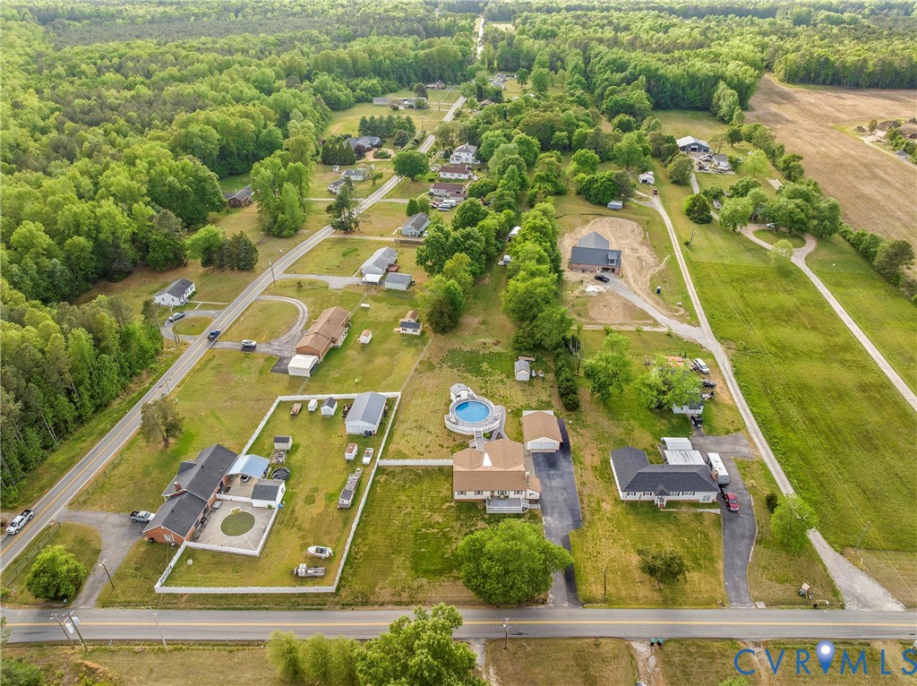 18024 Sandy Ford Road Petersburg, VA 23803 - Photo 64 of 66 an aerial view of a residential houses with yard