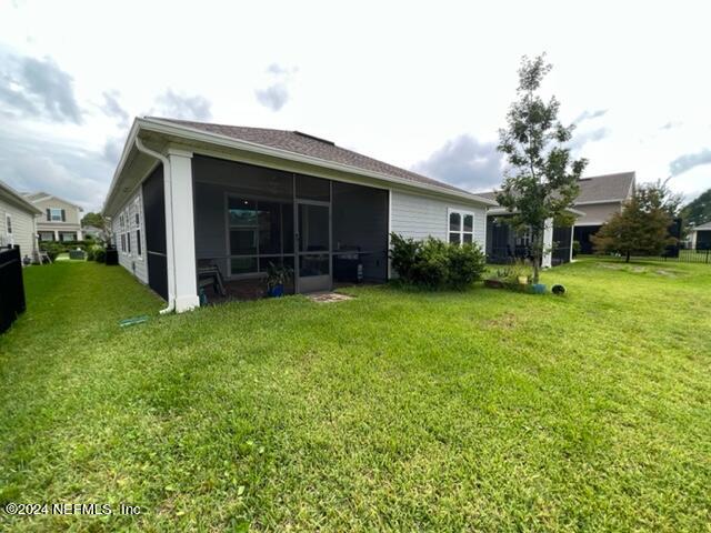 2333 Reese Way Jacksonville, FL 32246 - Photo 24 of 29 a view of a house with backyard and garden