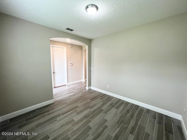 2333 Reese Way Jacksonville, FL 32246 - Photo 5 of 29 a view of an empty room and wooden floor