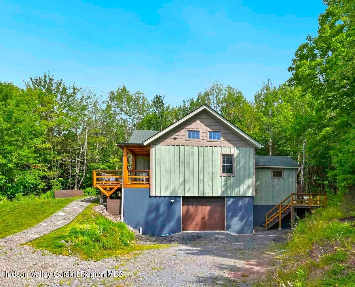 10 County Road Windham, NY 12496 - Photo 40 of 43 a front view of a house with garden