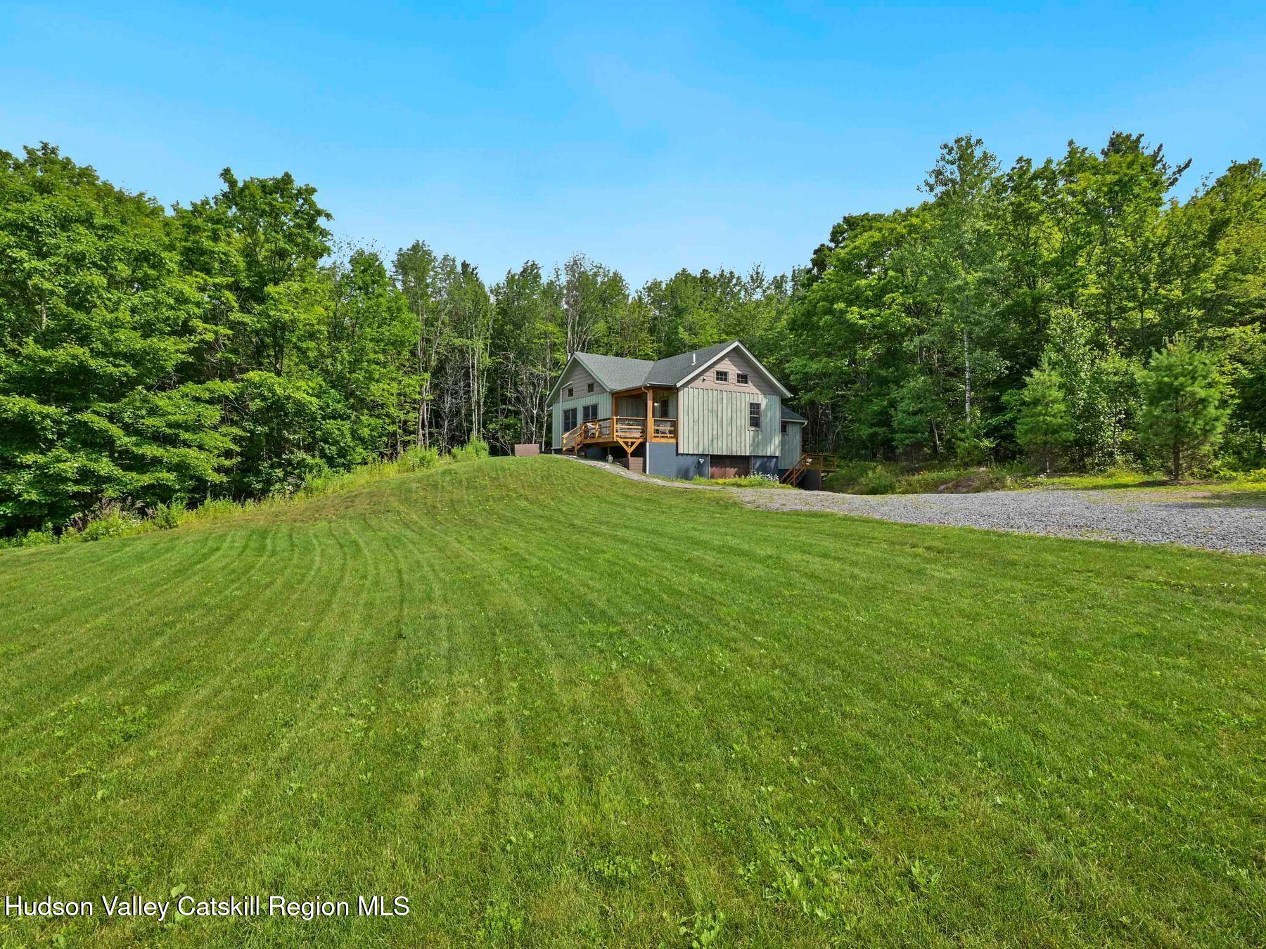 10 County Road Windham, NY 12496 - Photo 42 of 43 a house view with a garden space