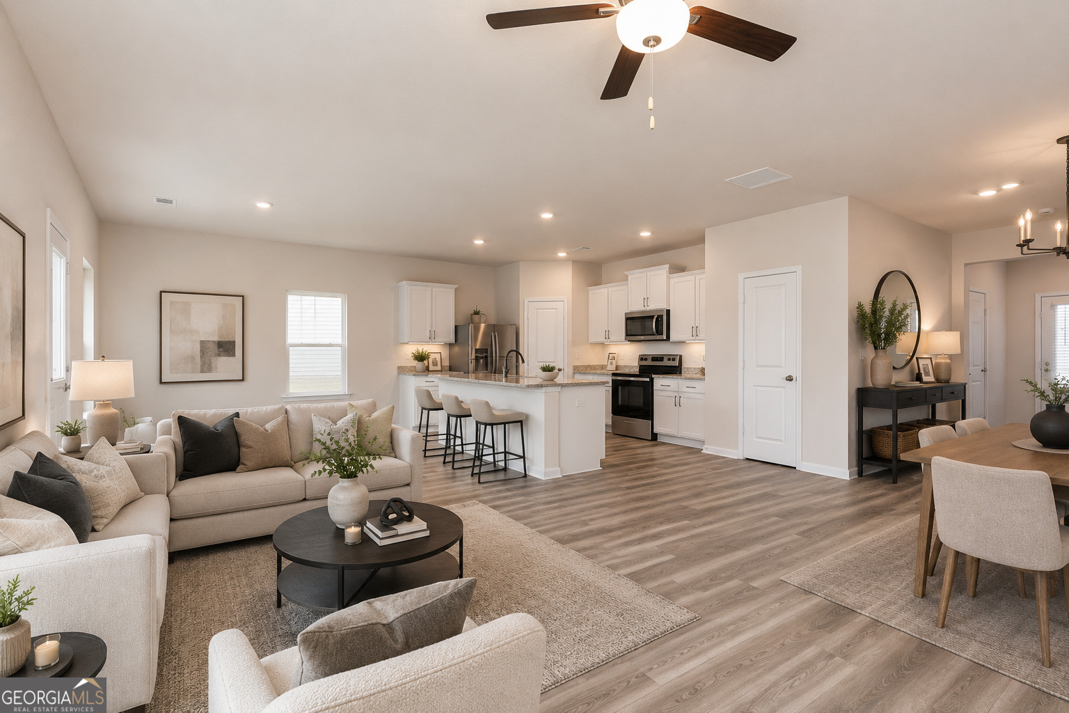 634 Slate Road Conyers, GA 30013 - Photo 20 of 22 a living room with furniture and kitchen view