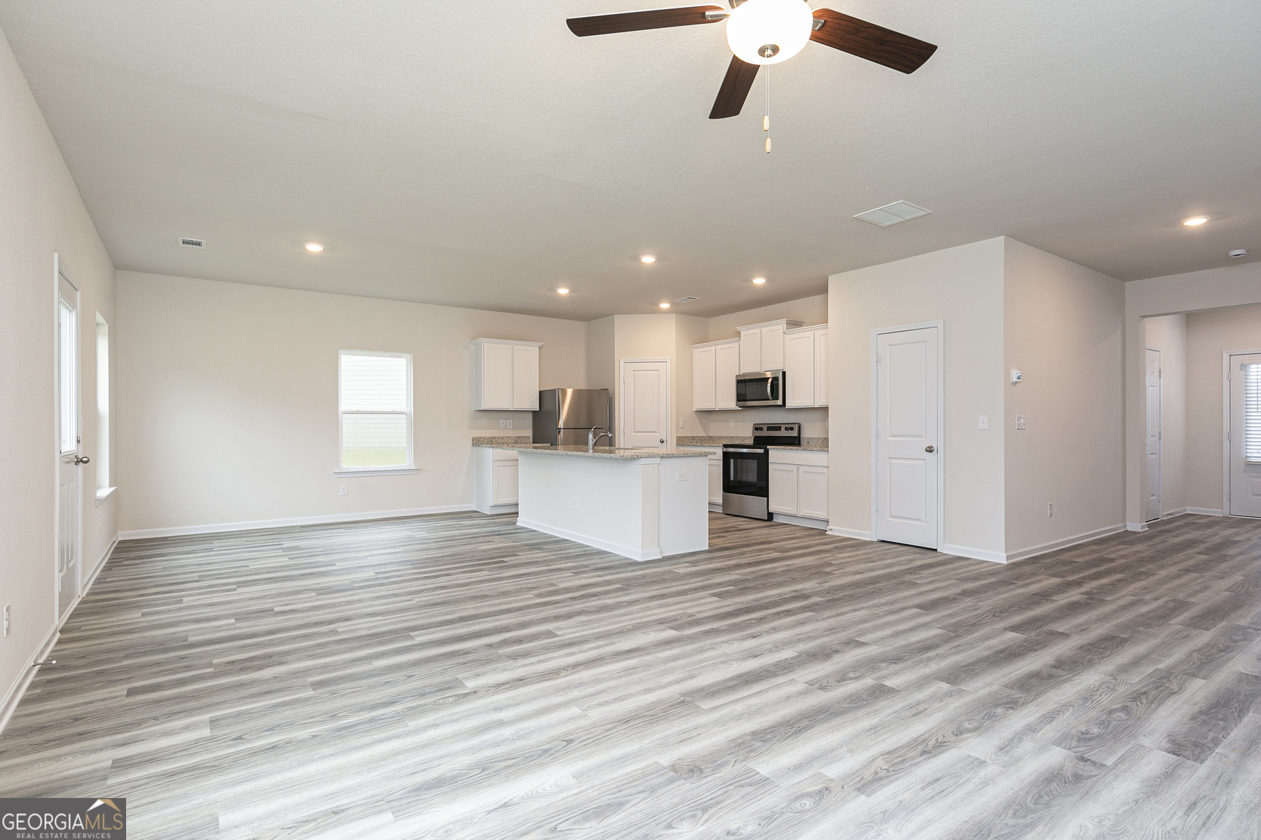634 Slate Road Conyers, GA 30013 - Photo 8 of 22 a view of kitchen with refrigerator and window
