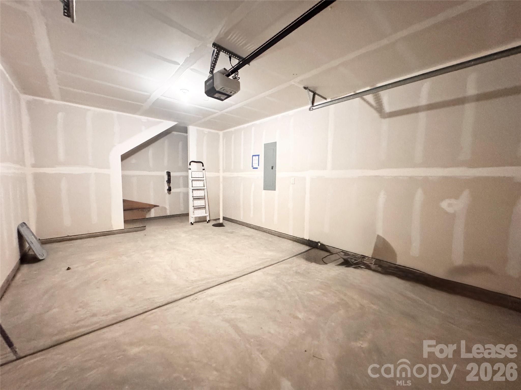 6131 Faron Way Charlotte, NC 28262 - Photo 16 of 18 a view of a room with racks on the wall