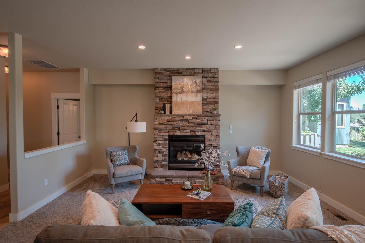 61915 Fall Creek Loop Bend, OR 97702 - Photo 10 of 24 The door on the left leads to the main l