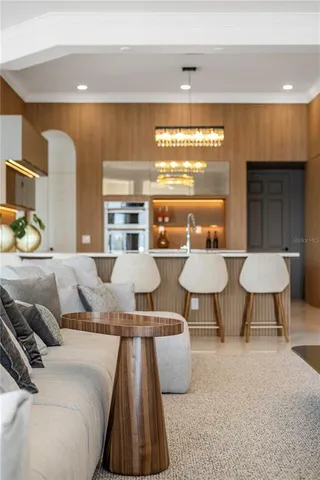 a bedroom with a balcony a bed and a couch