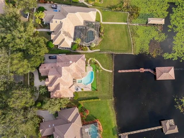 a view of a dining room with furniture and window