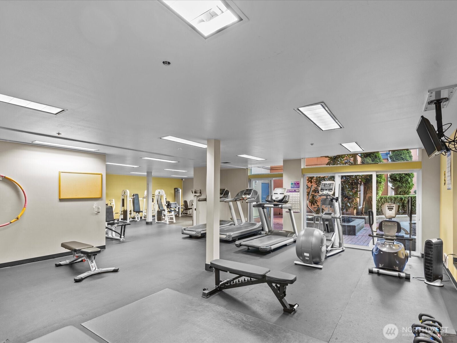 2415 2nd Avenue, Unit 540 Seattle, WA 98121 - Photo 27 of 29 a view of a room with gym equipment