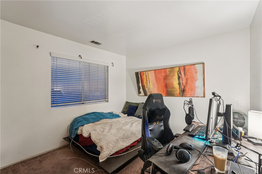 988 Cimarron Place Corona, CA 92879 - Photo 16 of 23 a living room with furniture and a window