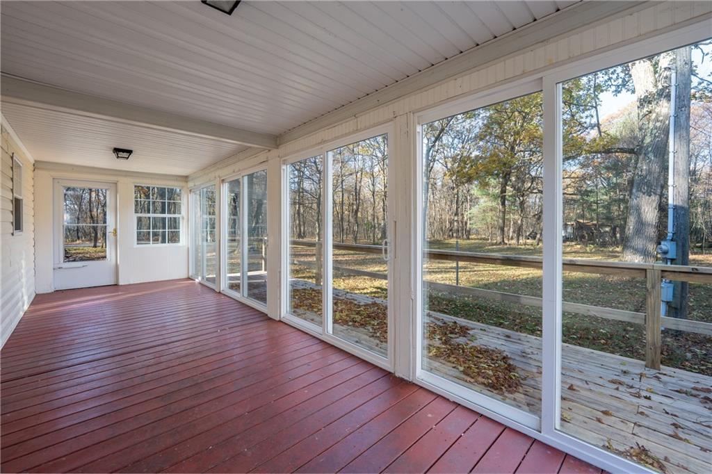 402 Ridgeview Road Boswell, PA 15531 - Photo 22 of 32 a view of empty room with wooden floor and floor to ceiling window