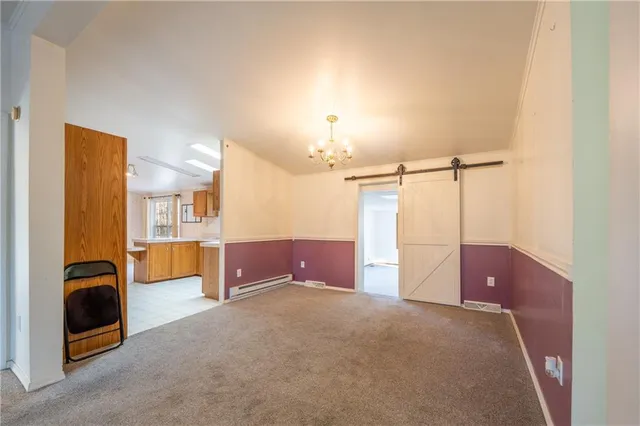 a view of livingroom with window and furniture