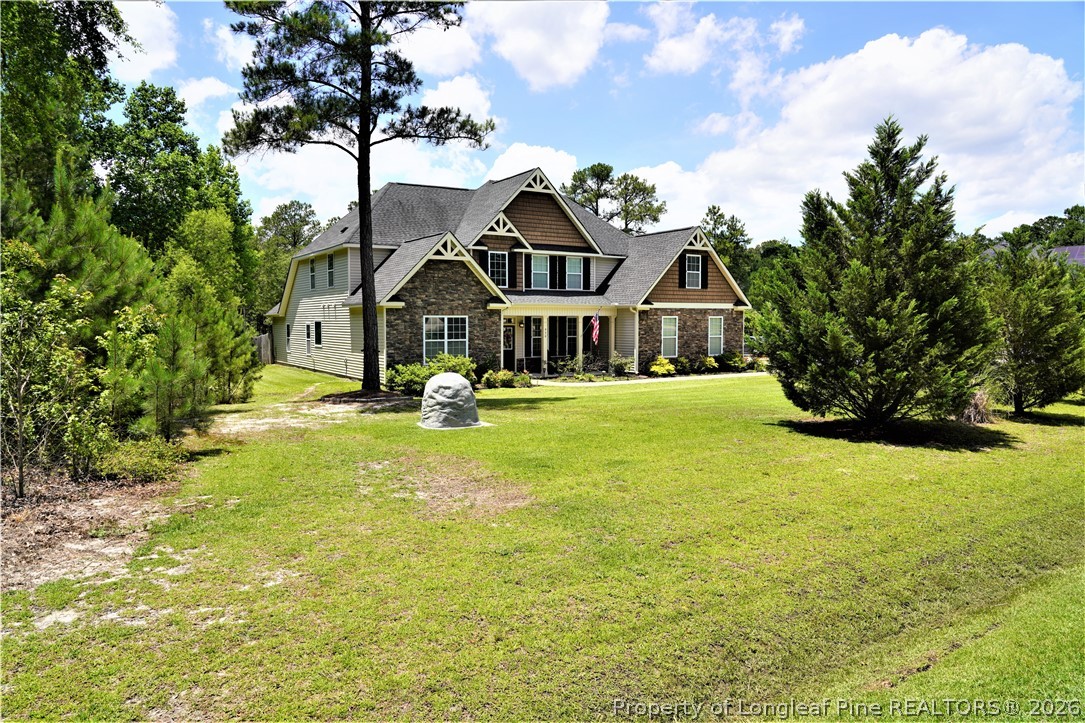 930 Old Vander Road Fayetteville, NC 28312 - Photo 3 of 45 a front view of a house with a yard