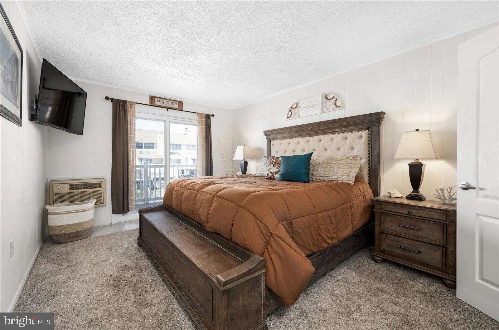 714 Mooring Road, Unit C105 Ocean City, MD 21842 - Photo 21 of 36 Primary bedroom with access to the deck