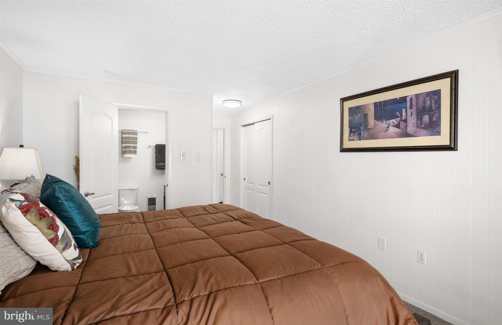 714 Mooring Road, Unit C105 Ocean City, MD 21842 - Photo 23 of 36 Primary bedroom with en-suite bathroom
