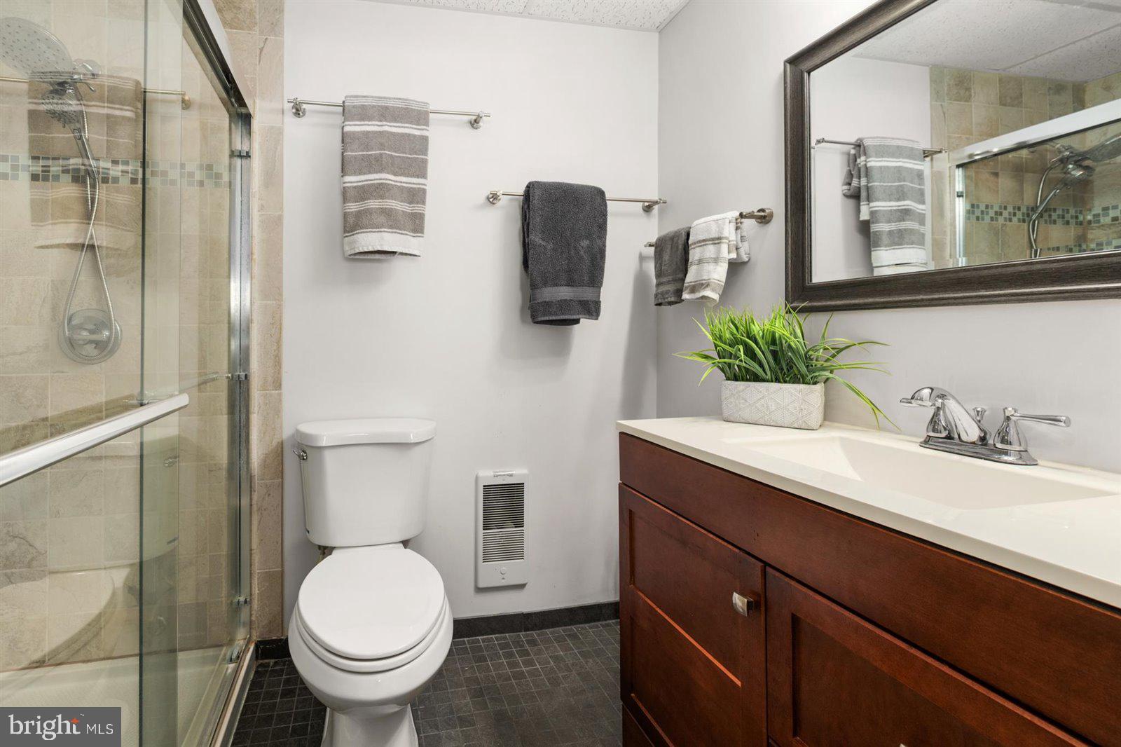 714 Mooring Road, Unit C105 Ocean City, MD 21842 - Photo 24 of 36 Primary bathroom with custom tiled shower
