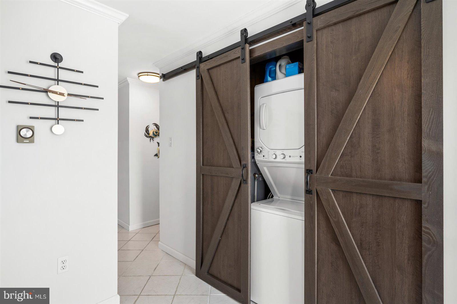 714 Mooring Road, Unit C105 Ocean City, MD 21842 - Photo 30 of 36 Laundry with custom barn doors