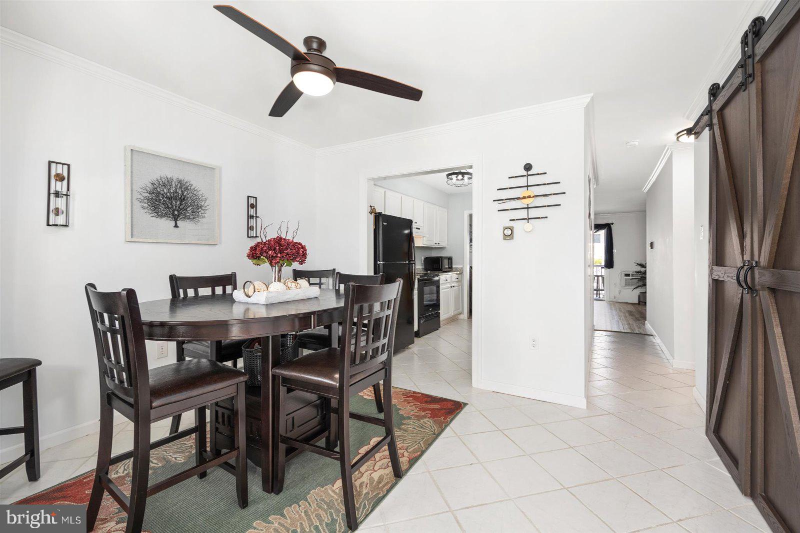 714 Mooring Road, Unit C105 Ocean City, MD 21842 - Photo 8 of 36 Dining area with ceiling fan