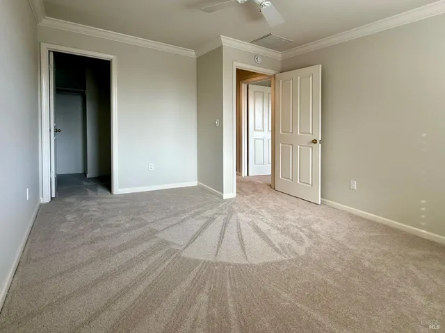 a bathroom with a sink double vanity granite tub and shower