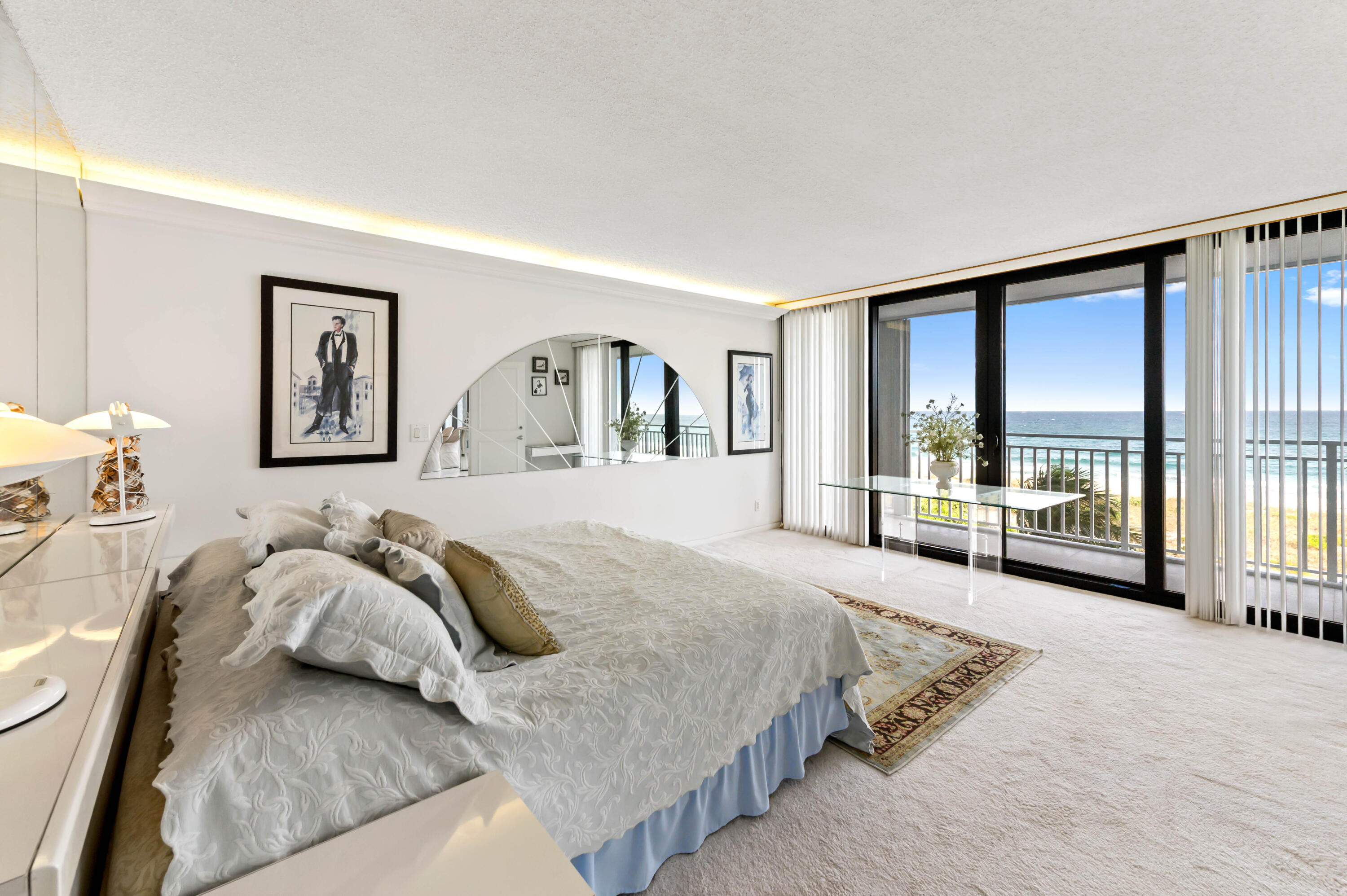 2600 South Ocean Boulevard, Unit 3E Boca Raton, FL 33432 - Photo 18 of 56 a spacious bedroom with a large bed and a large window