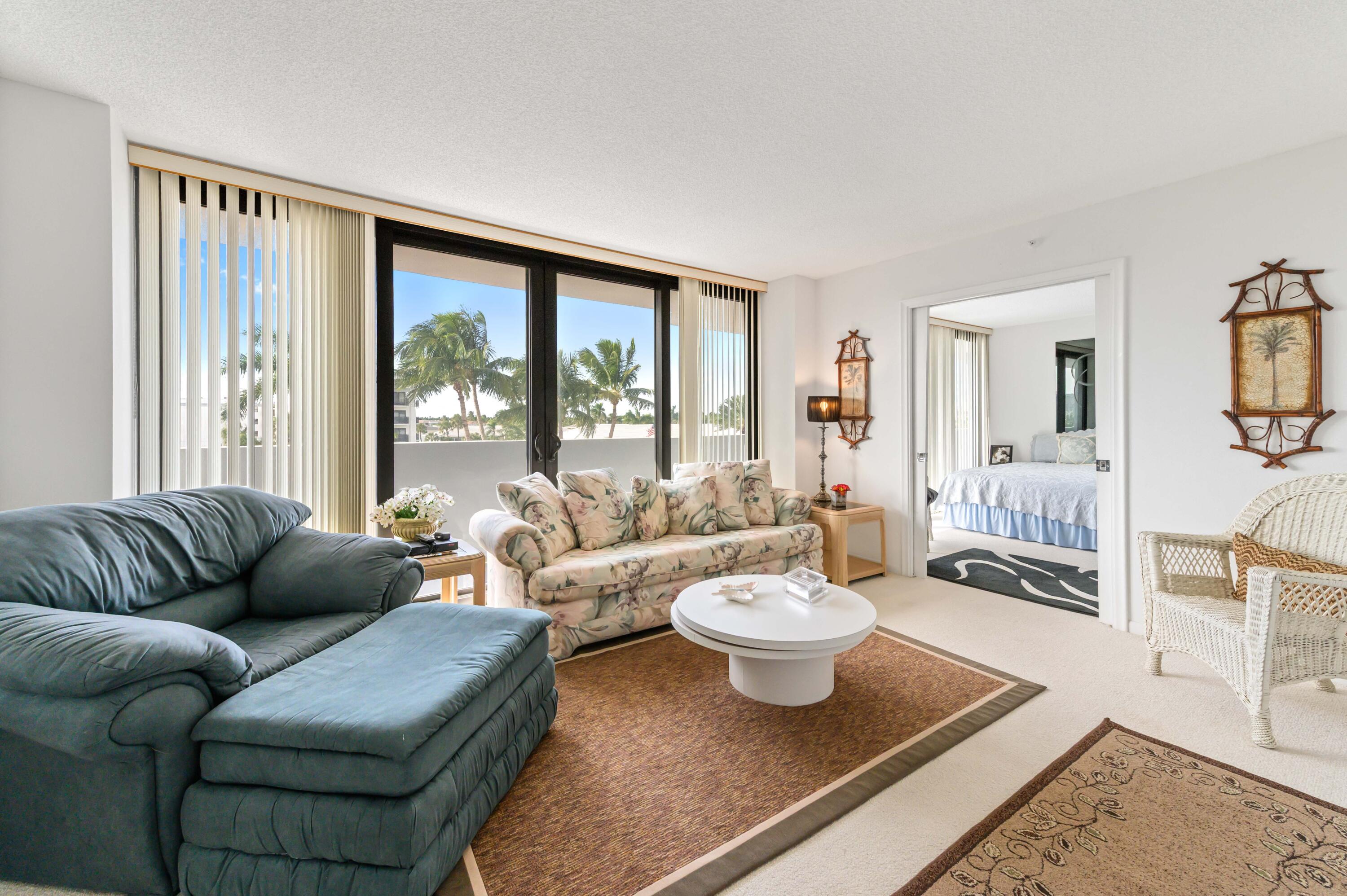 2600 South Ocean Boulevard, Unit 3E Boca Raton, FL 33432 - Photo 24 of 56 a living room with furniture and a large window