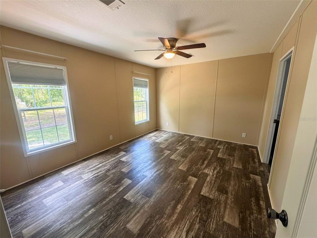 9827 Southeast Hoth Road Arcadia, FL 34266 - Photo 18 of 28 a view of an empty room and window