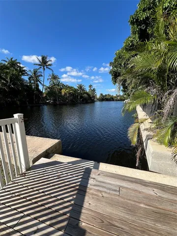 a view of a lake from a balcony
