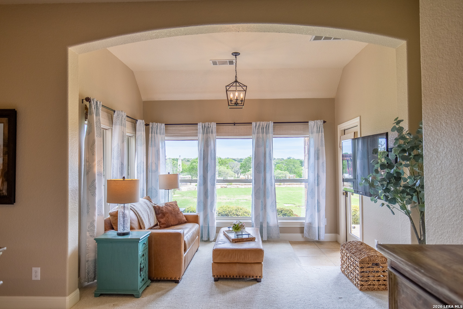 395 Bluff Creek Road North Center Point, TX 78010 - Photo 11 of 50 a living room with furniture and a large window