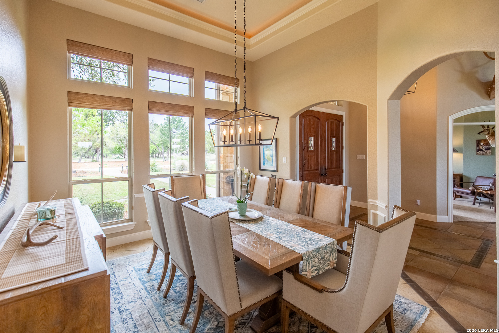 395 Bluff Creek Road North Center Point, TX 78010 - Photo 14 of 50 a view of a dining room with furniture window and outside view